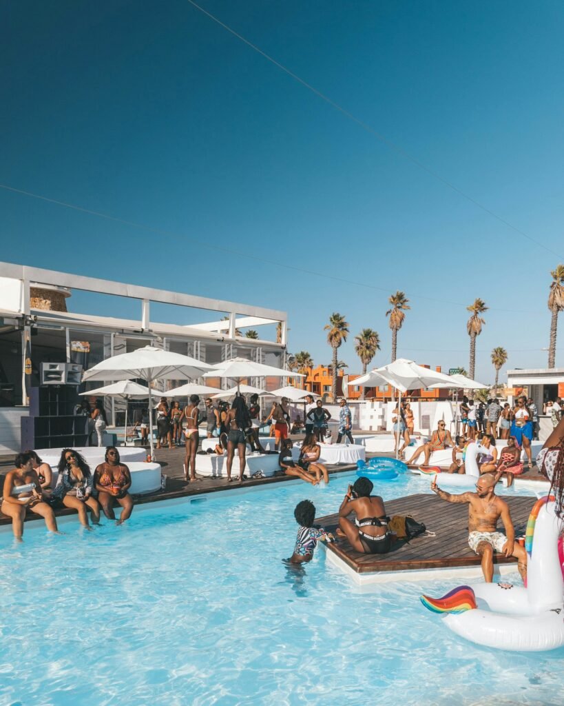 People enjoying a pool party in the sun