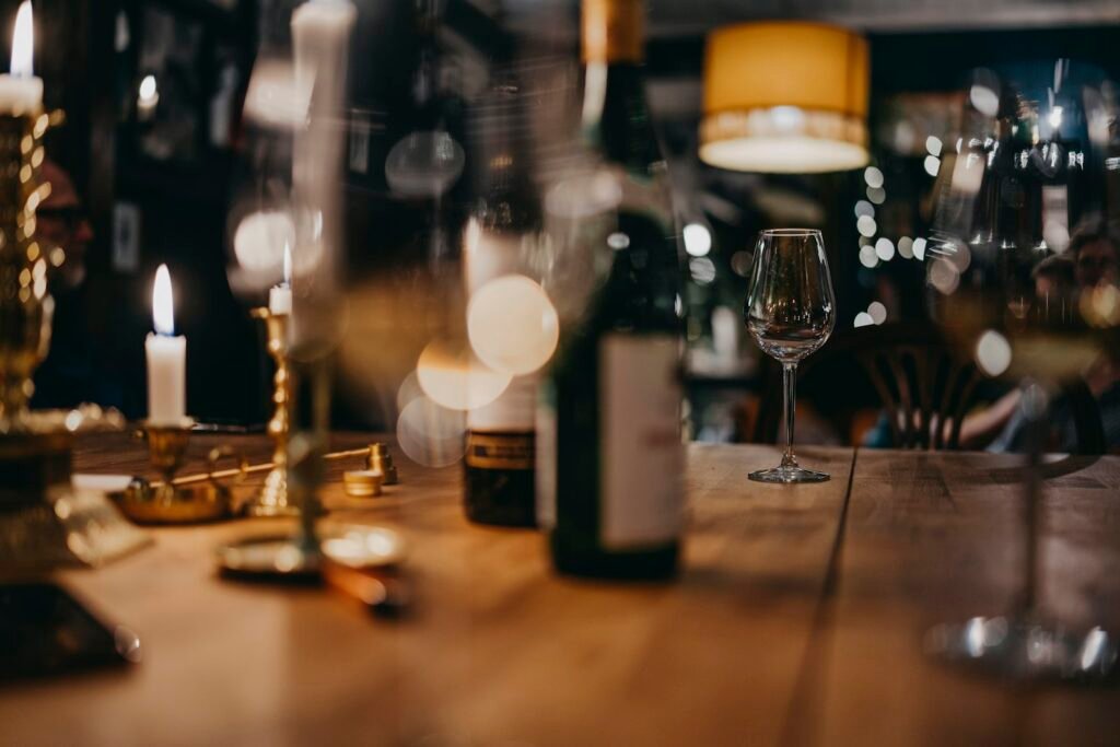 Bottle of wine on a wooden table in a Valletta wine bar